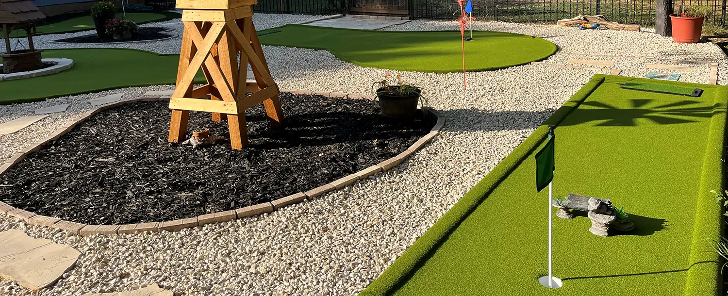 Backyard golf green installed by SYNLawn